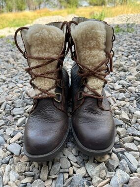 Sorel Phoenix Short Lace Cozy Boots in a brown, textured leather